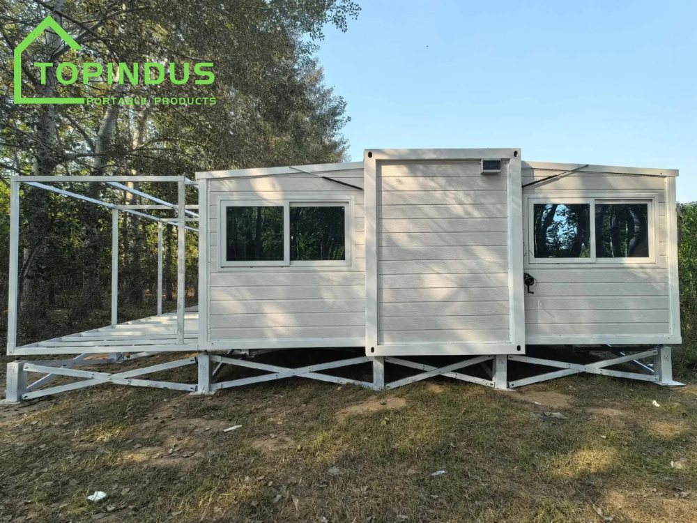 Casa contenedor plegable expandible australiana personalizada con terraza.